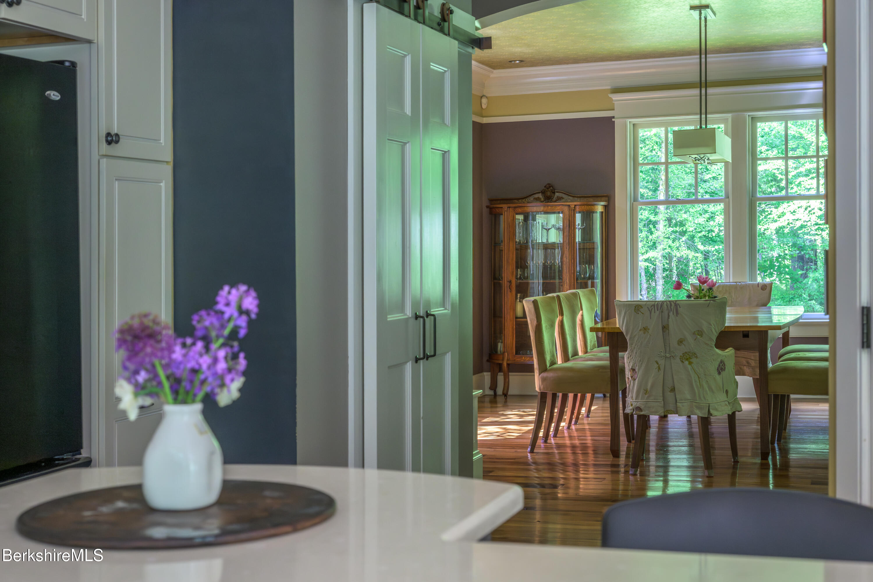 430 Lenox Road Richmond, MA 01254 - Photo 10 of 66 a view of a dining room with furniture window and wooden floor