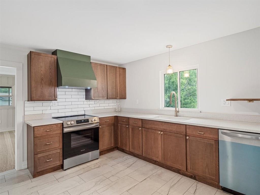 1403 Blackhawk Road Darlington, PA 16115 - Photo 16 of 29 a kitchen with a sink and cabinets
