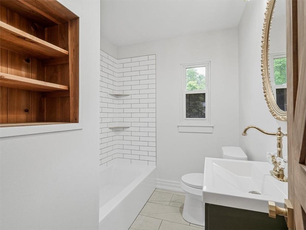 1403 Blackhawk Road Darlington, PA 16115 - Photo 20 of 29 a bathroom with a toilet sink and bathtub