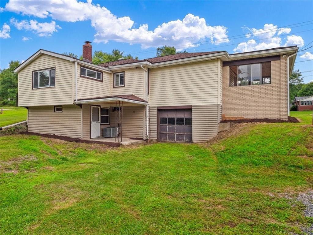 1403 Blackhawk Road Darlington, PA 16115 - Photo 26 of 29 a view of a house with a backyard