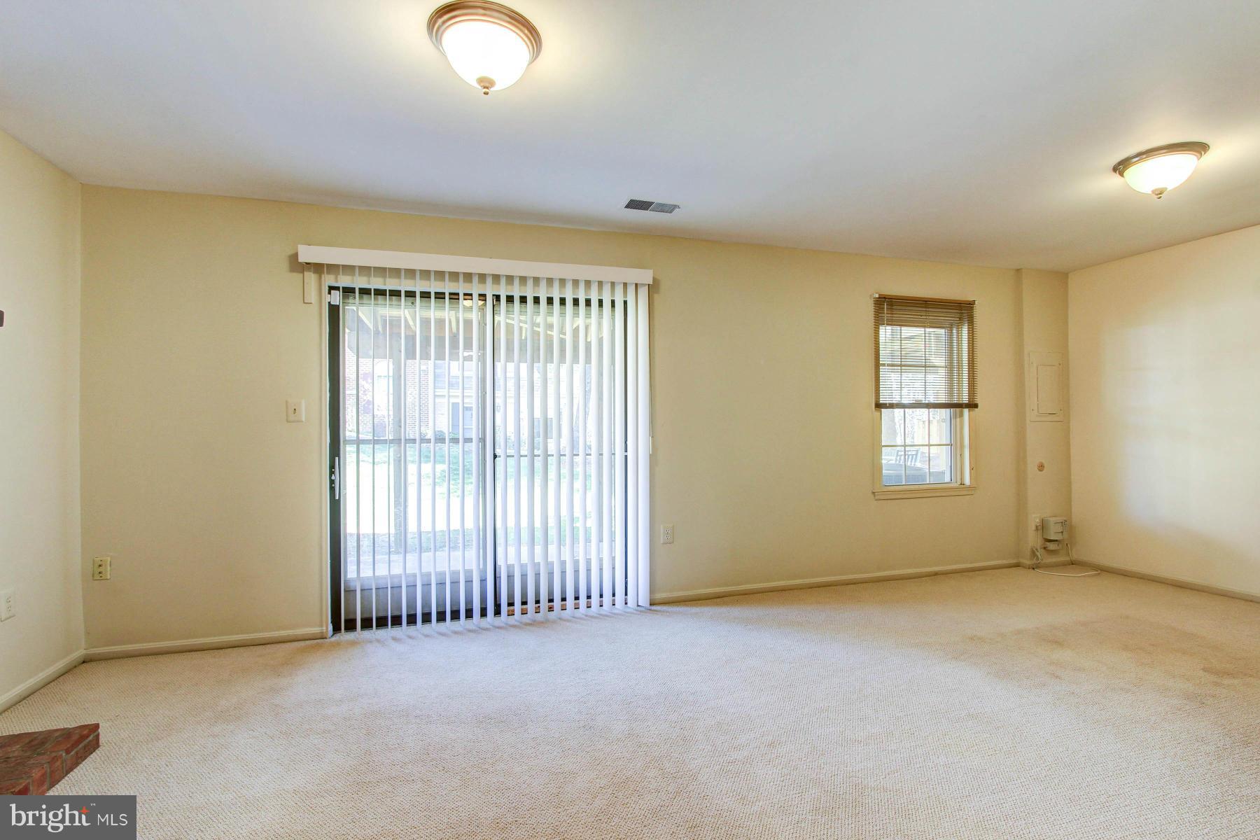 11526 Pine Cone Court Reston, VA 20191 - Photo 23 of 30 Lower Level Recreation Room opens to patio