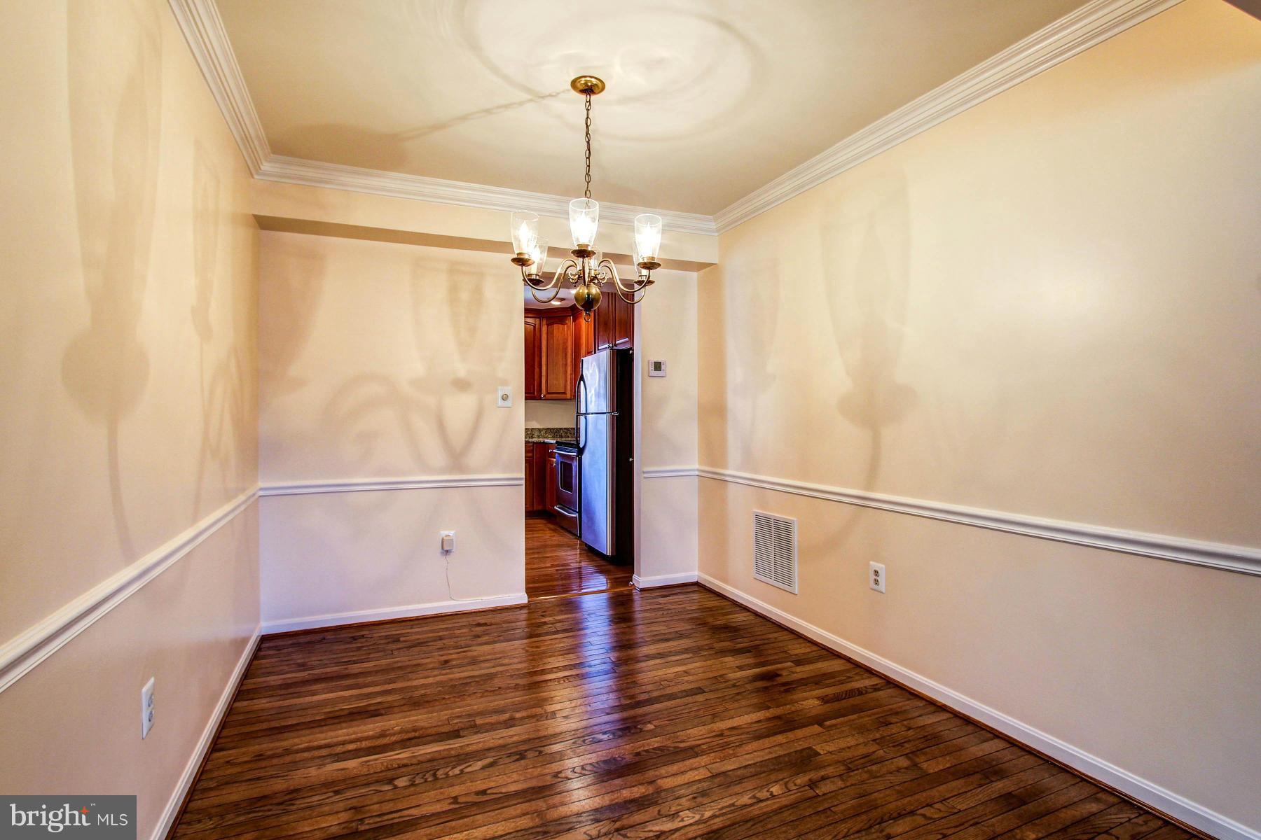 11526 Pine Cone Court Reston, VA 20191 - Photo 6 of 30 Dining Room opens to Living Room