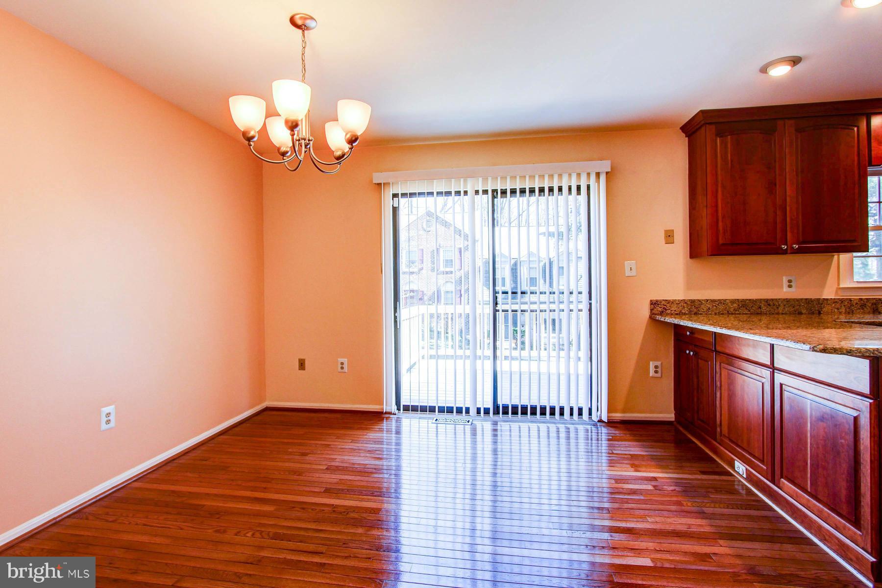 11526 Pine Cone Court Reston, VA 20191 - Photo 7 of 30 Kitchen opens to Large Deck