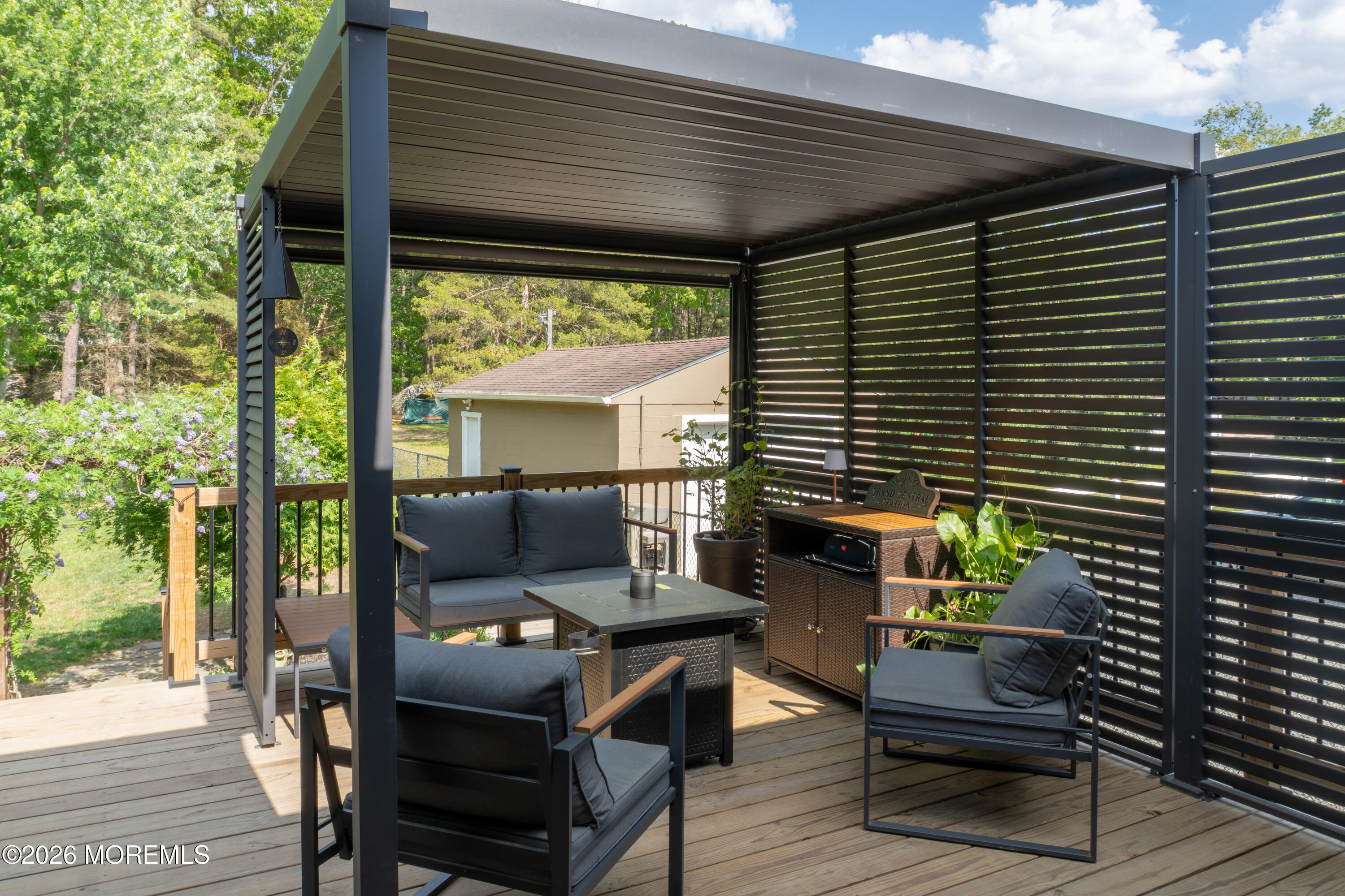 55 Toms River Road Jackson, NJ 08527 - Photo 26 of 31 a patio with table and chairs