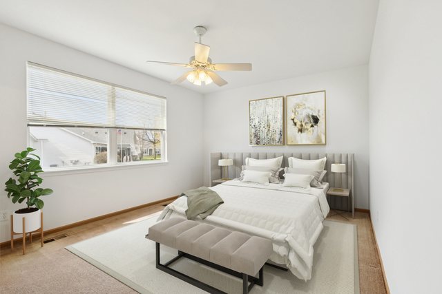 647 South Cadillac Circle Romeoville, IL 60446 - Photo 20 of 38 a bedroom with a bed and a window