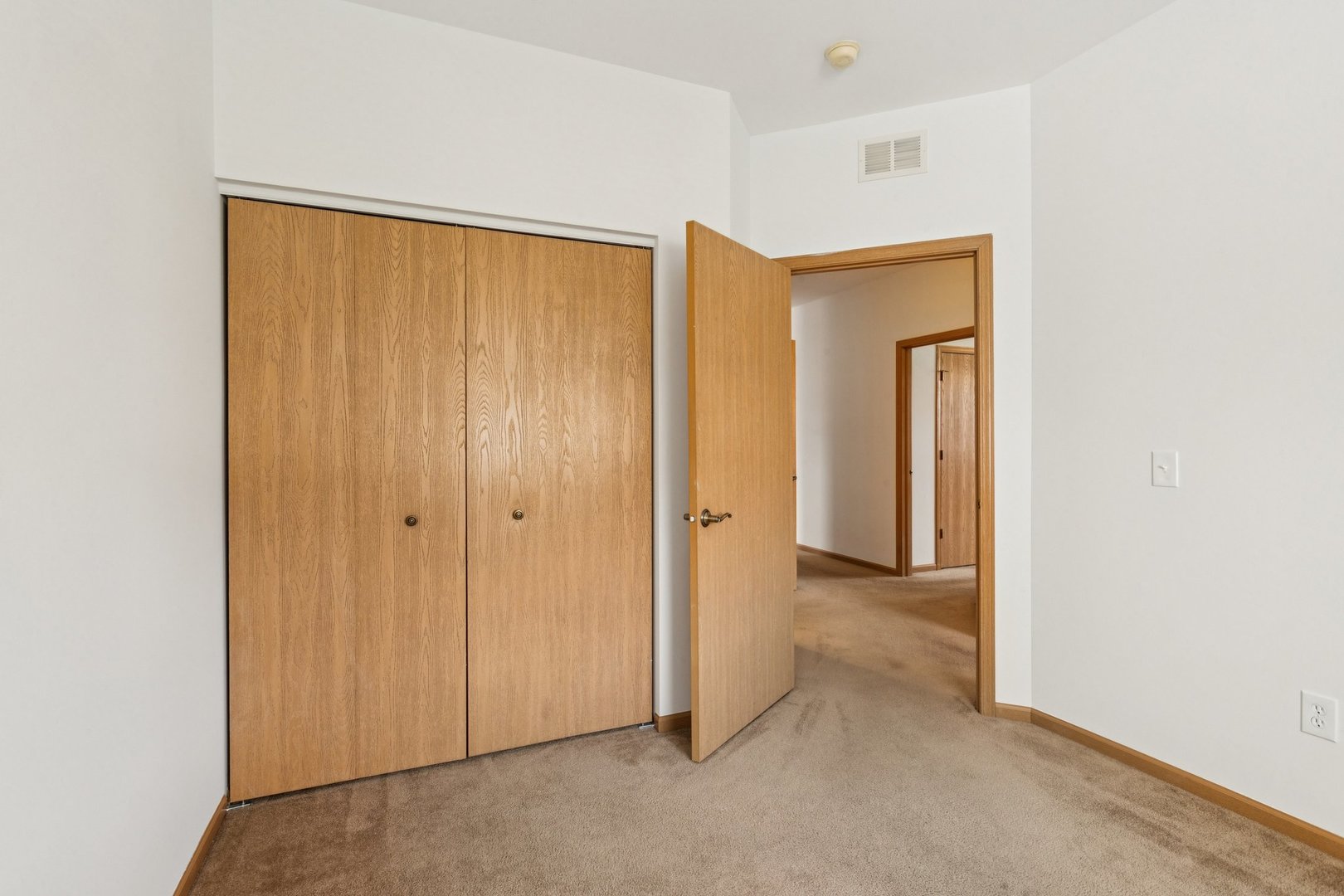 647 South Cadillac Circle Romeoville, IL 60446 - Photo 26 of 38 a view of a room with door