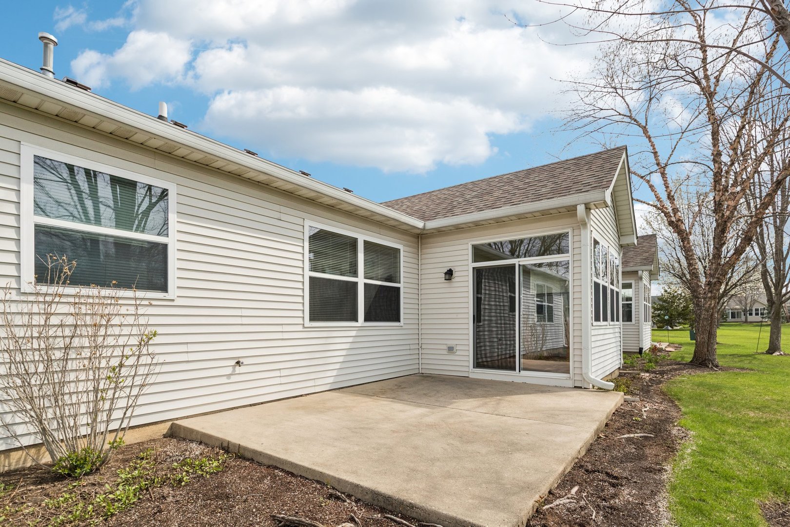 647 South Cadillac Circle Romeoville, IL 60446 - Photo 30 of 38 a view of a house with a yard