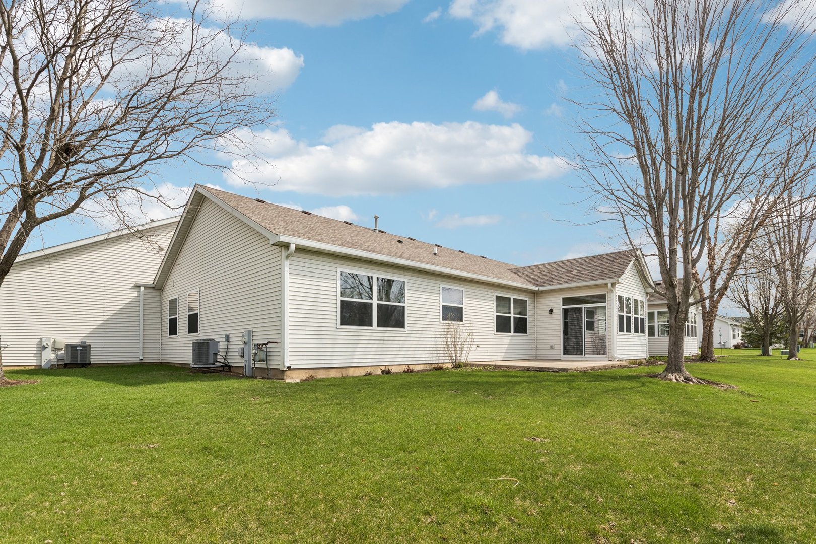 647 South Cadillac Circle Romeoville, IL 60446 - Photo 31 of 38 a front view of house with yard and green space