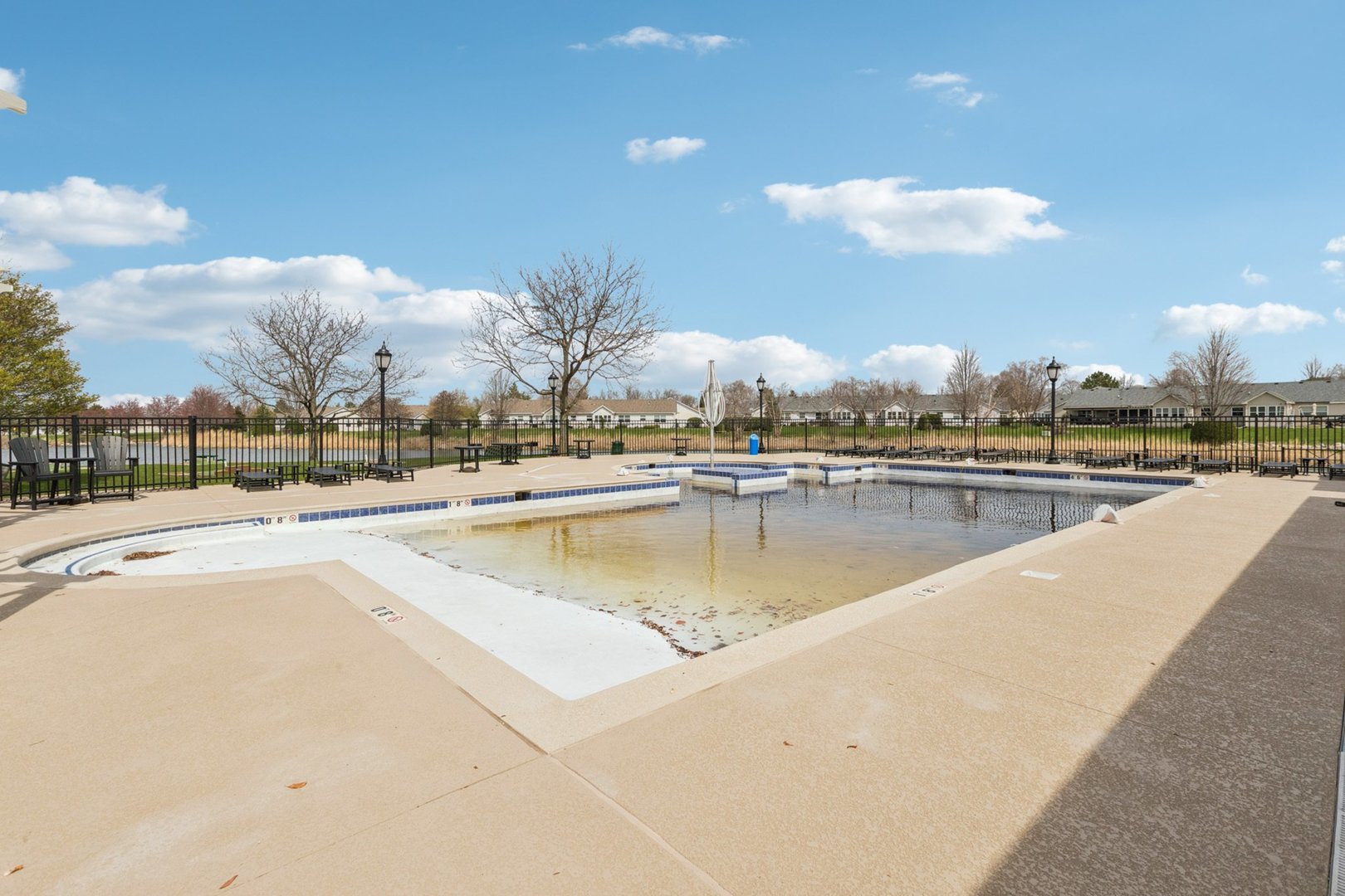 647 South Cadillac Circle Romeoville, IL 60446 - Photo 35 of 38 a view of a lake with a nearby beach