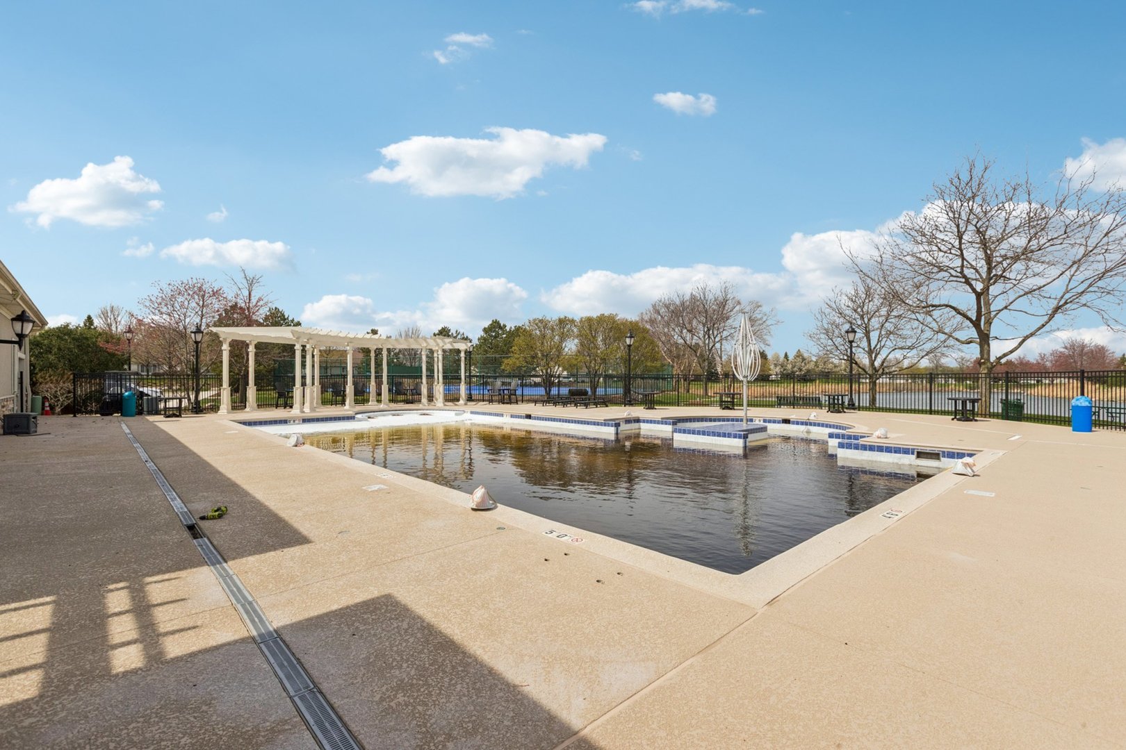647 South Cadillac Circle Romeoville, IL 60446 - Photo 36 of 38 a view of a swimming pool with outdoor seating