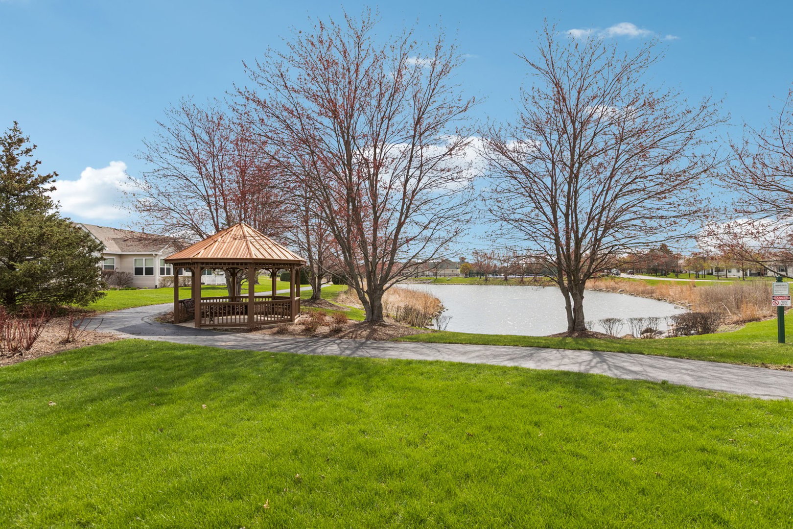 647 South Cadillac Circle Romeoville, IL 60446 - Photo 37 of 38 a view of a yard with plants and large trees