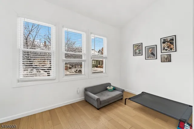 a view of livingroom with furniture and windows