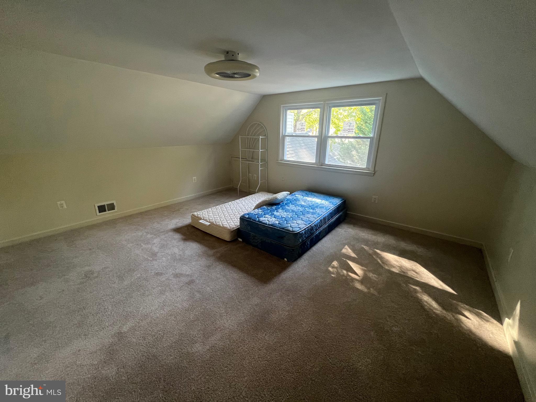 8139 Keeler Street Alexandria, VA 22309 - Photo 12 of 49 a living room with a bed furniture and a window