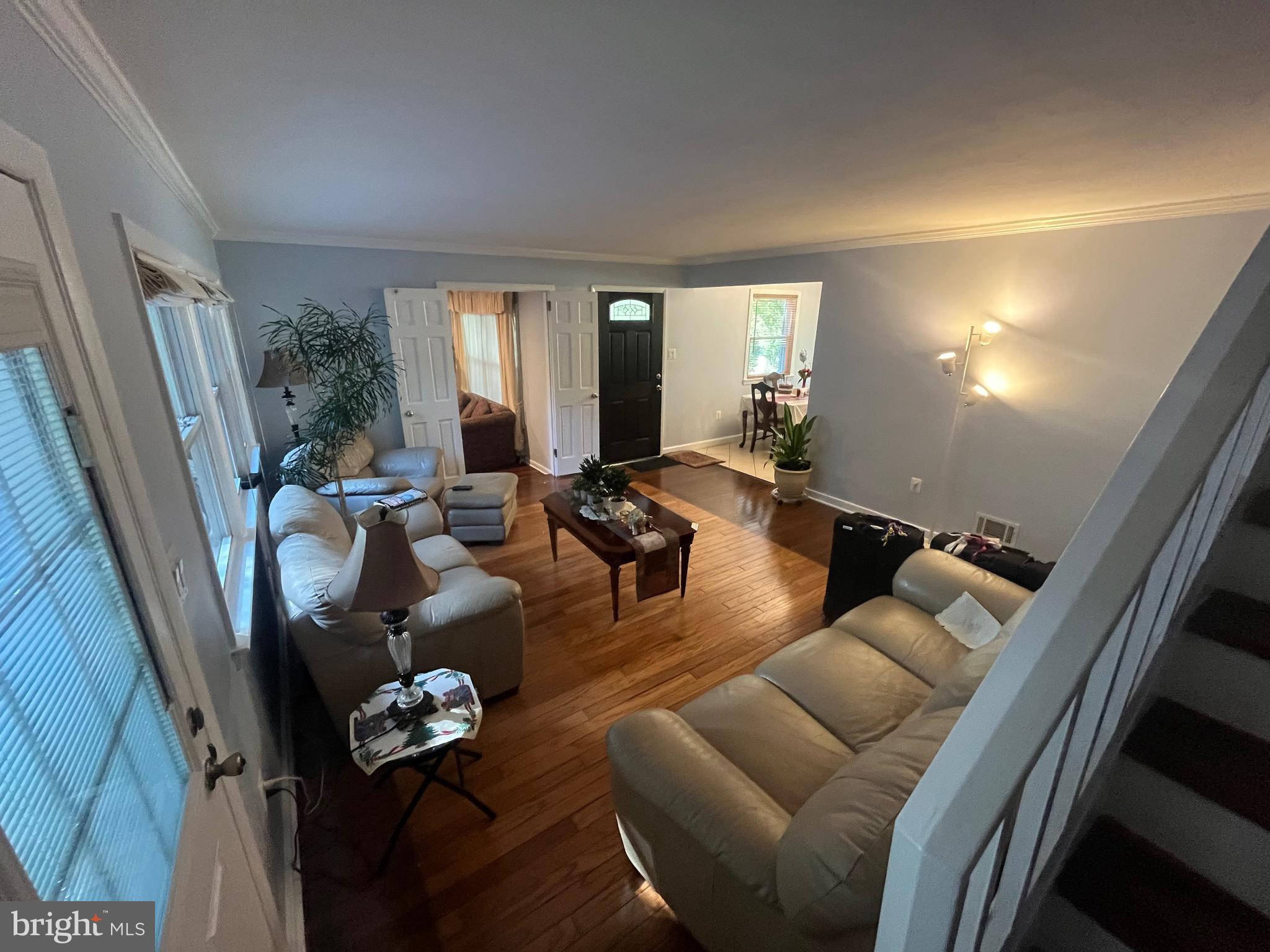 8139 Keeler Street Alexandria, VA 22309 - Photo 13 of 49 a living room with furniture and wooden floor