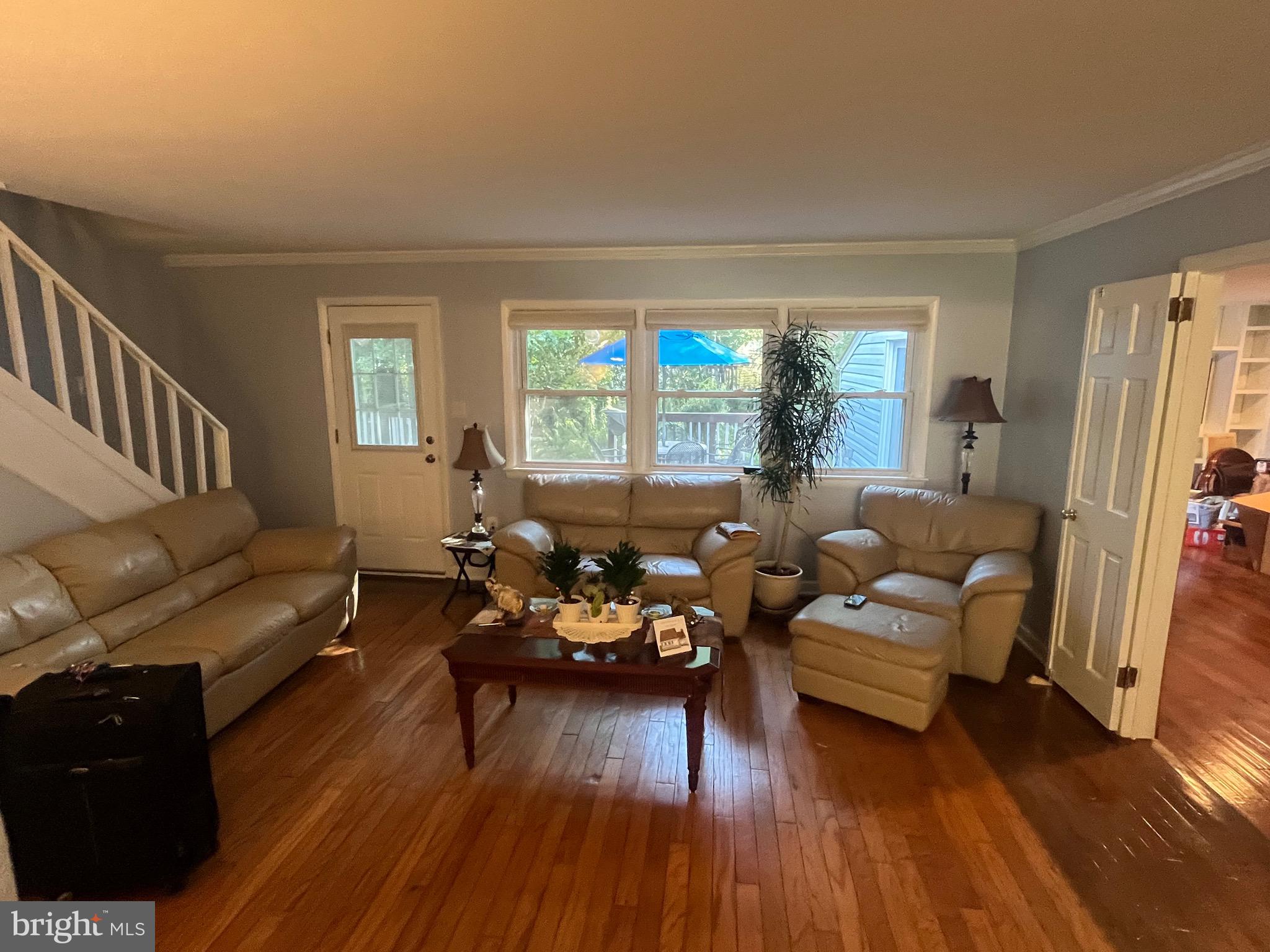8139 Keeler Street Alexandria, VA 22309 - Photo 2 of 49 a living room with furniture and a large window