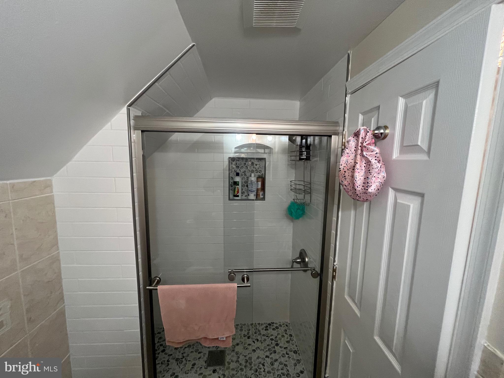 8139 Keeler Street Alexandria, VA 22309 - Photo 21 of 49 a bathroom with a shower