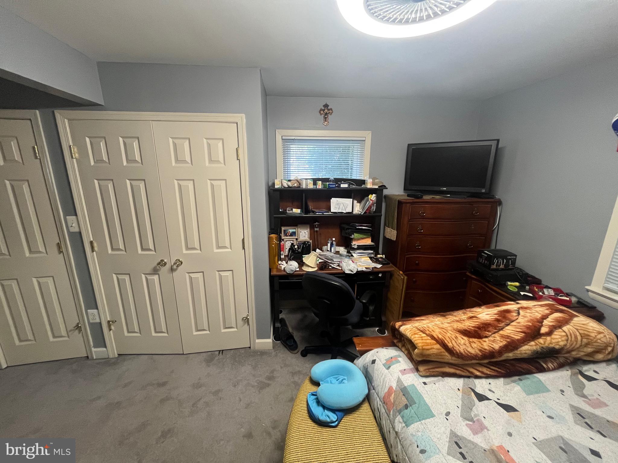 8139 Keeler Street Alexandria, VA 22309 - Photo 26 of 49 a bed room with furniture and a closet