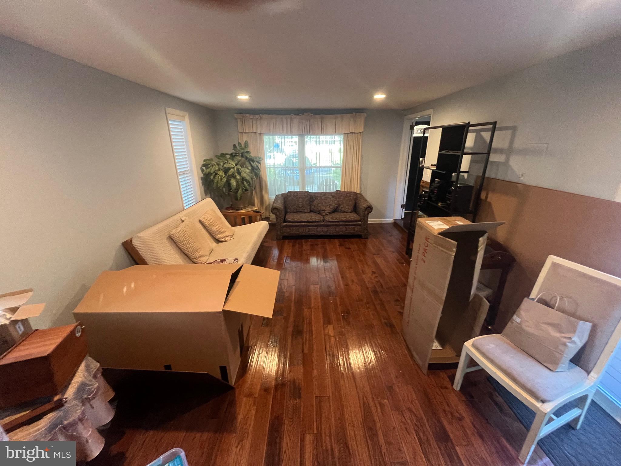 8139 Keeler Street Alexandria, VA 22309 - Photo 37 of 49 a living room with furniture and wooden floor