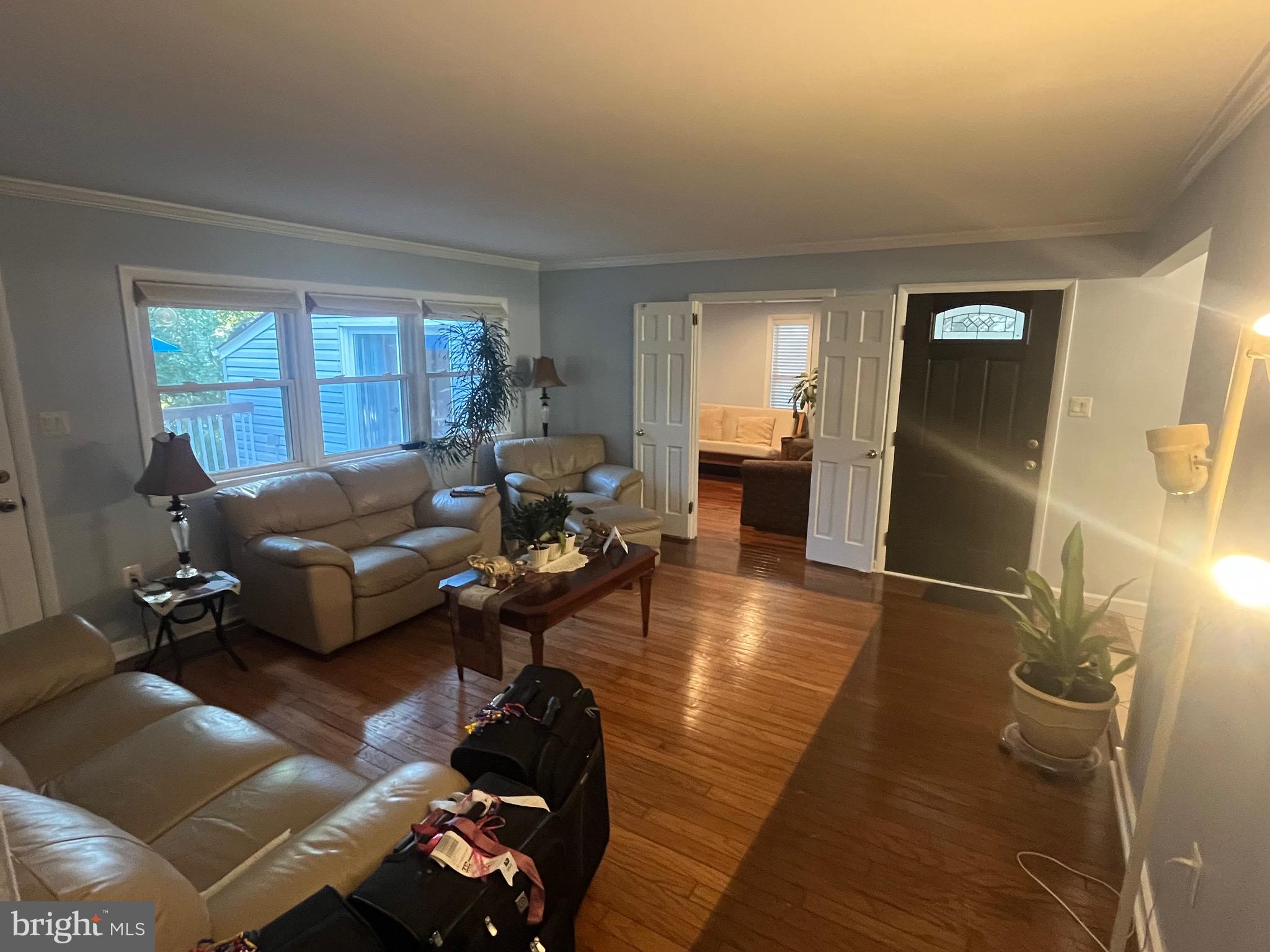 8139 Keeler Street Alexandria, VA 22309 - Photo 5 of 49 a living room with furniture and wooden floor
