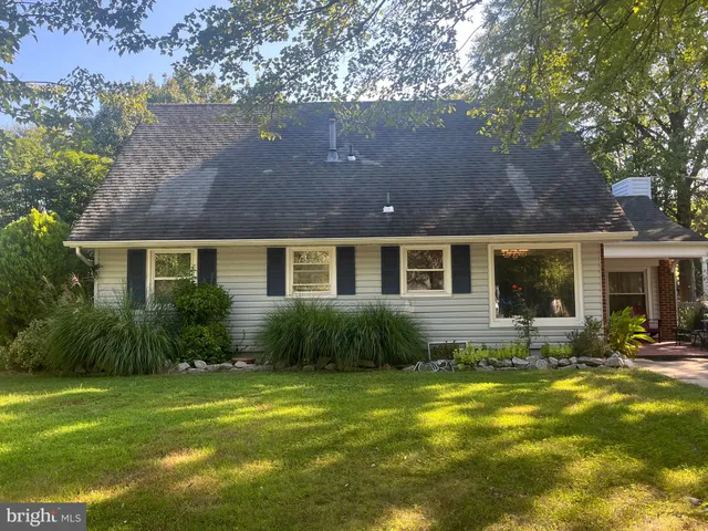 a view of a house with a swimming pool