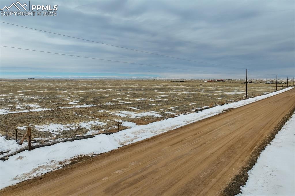 32290 North Neely Road Yoder, CO 80864 - Photo 3 of 26 a view of an ocean and beach