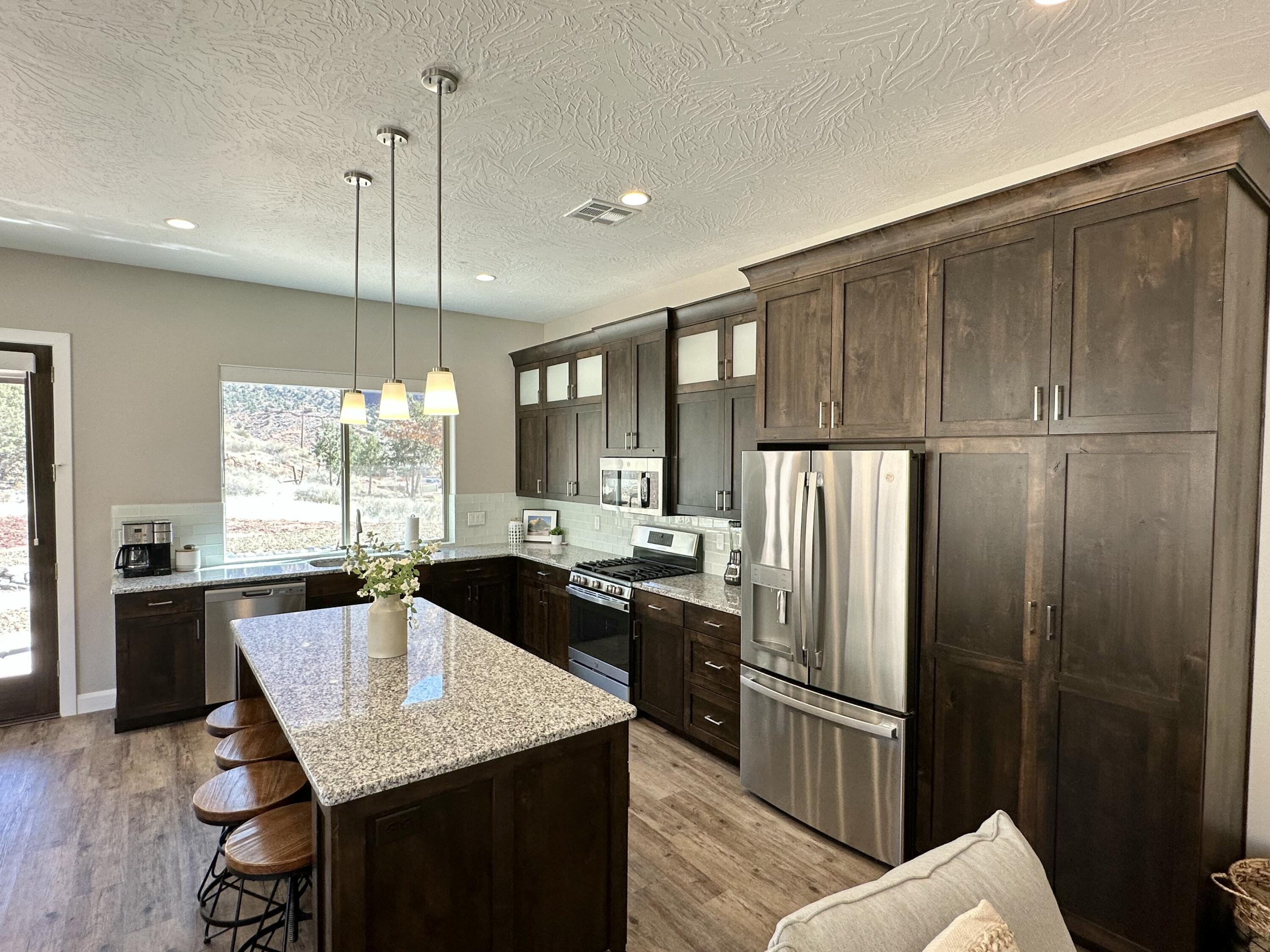 108 Trapper Circle, Unit C Springdale, UT 84767 - Photo 14 of 29 Alder Cabinetry & Stainless Appliances
