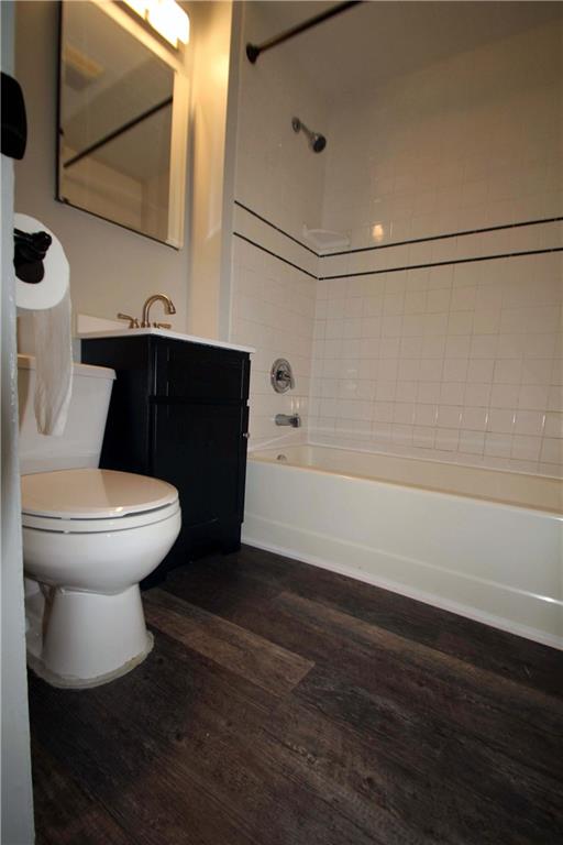 229 Edmond Street Pittsburgh, PA 15224 - Photo 15 of 22 a bathroom with a toilet and a shower