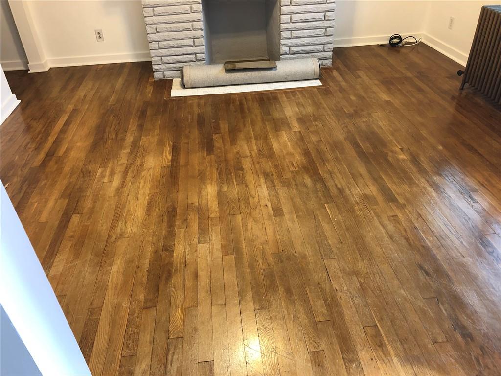229 Edmond Street Pittsburgh, PA 15224 - Photo 5 of 22 a view of a room with wooden floor