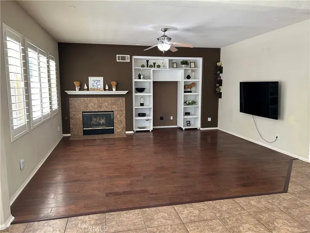 a view of living room with furniture and flat screen tv