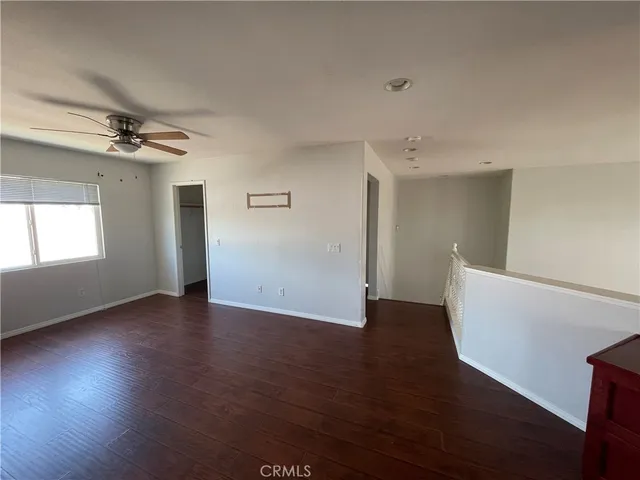 a spacious bathroom with a double vanity sink mirror and shower
