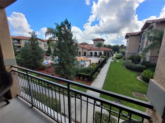 a view of a porch and a yard