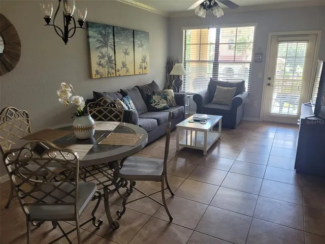 a living room with furniture and a window