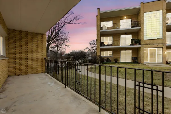 a view of a building from a balcony