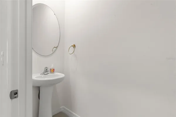 a view of a hallway with front door