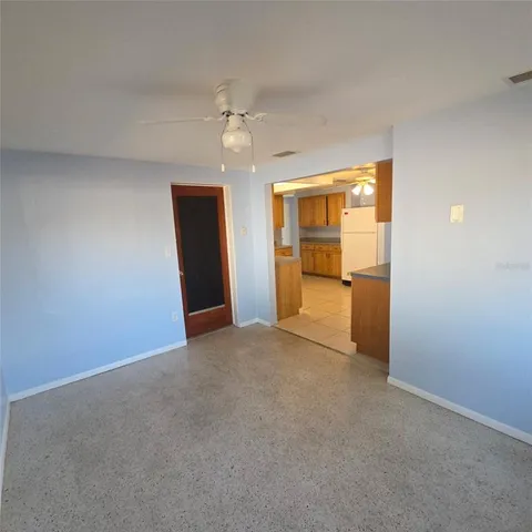 an empty room with a bathroom