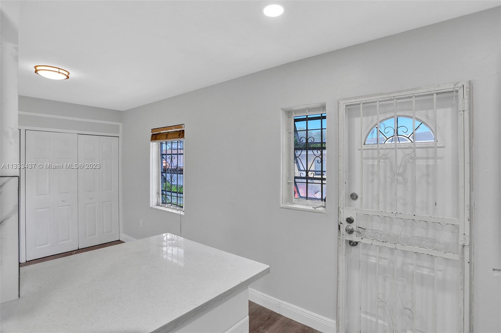 1101 Northwest 147th Street Miami, FL 33168 - Photo 12 of 45 a view of livingroom with furniture and window