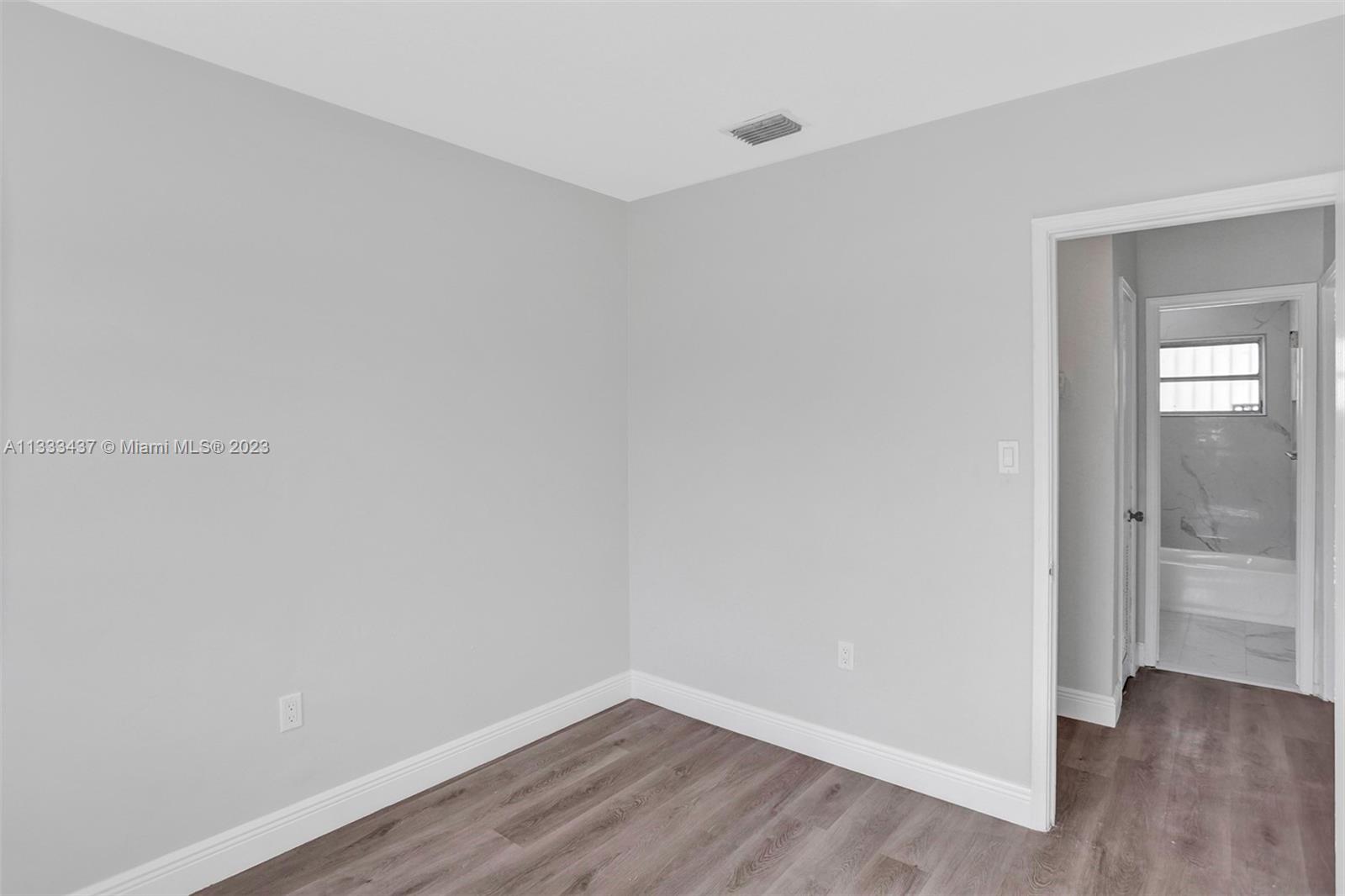 1101 Northwest 147th Street Miami, FL 33168 - Photo 15 of 45 a view of an empty room