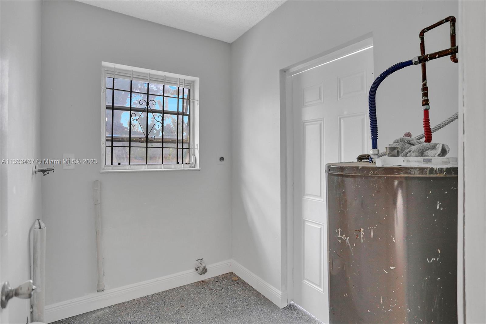 1101 Northwest 147th Street Miami, FL 33168 - Photo 33 of 45 a room with a sink and a mirror