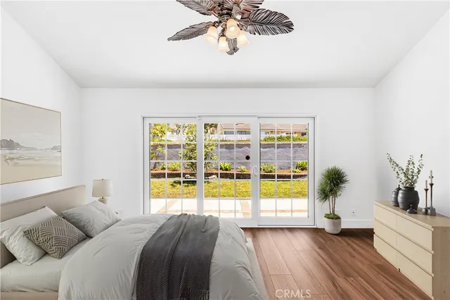 a view of a swimming pool with a yard