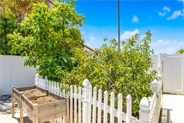 aerial view of a house with yard swimming pool and outdoor seating