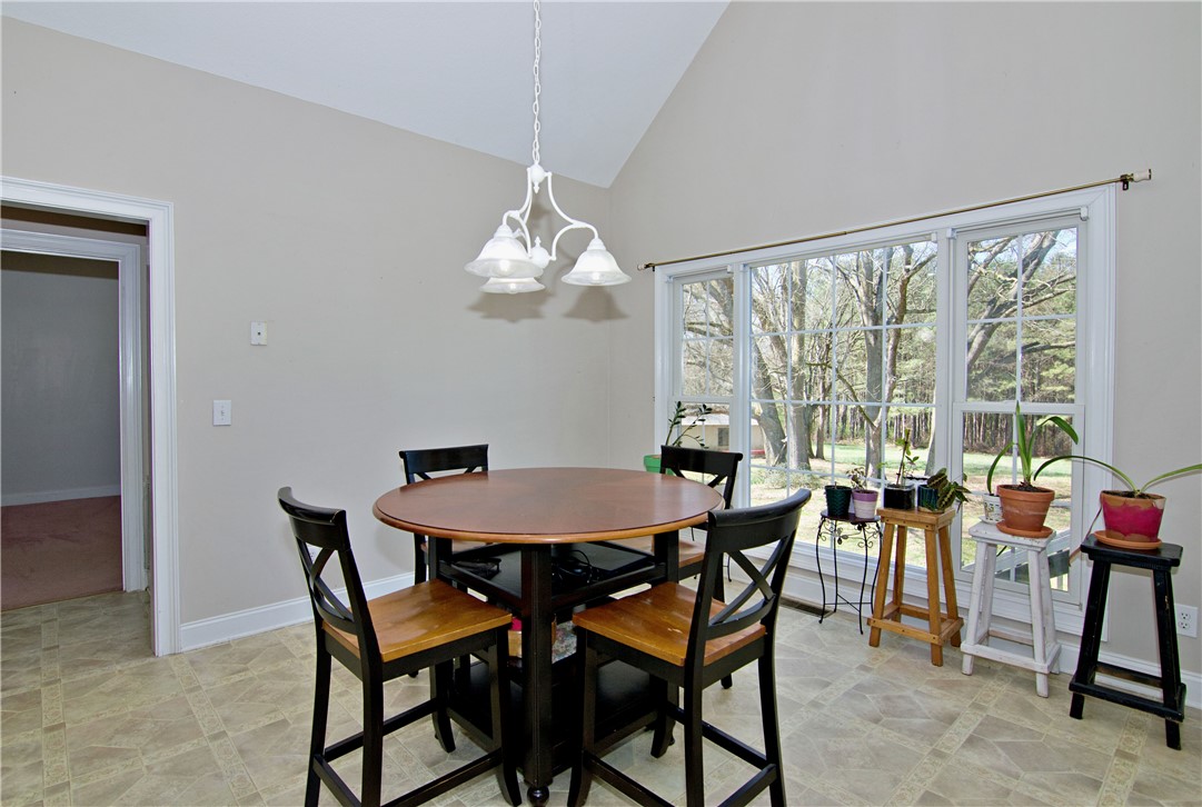 7893 Athens Road Carnesville, GA 30521 - Photo 10 of 50 This bright breakfast area features ample natural light and a charming view of the outdoors.