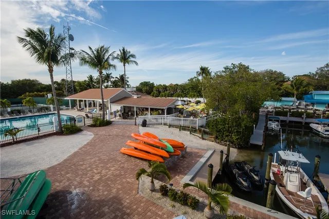 an aerial view of a house with a ocean view
