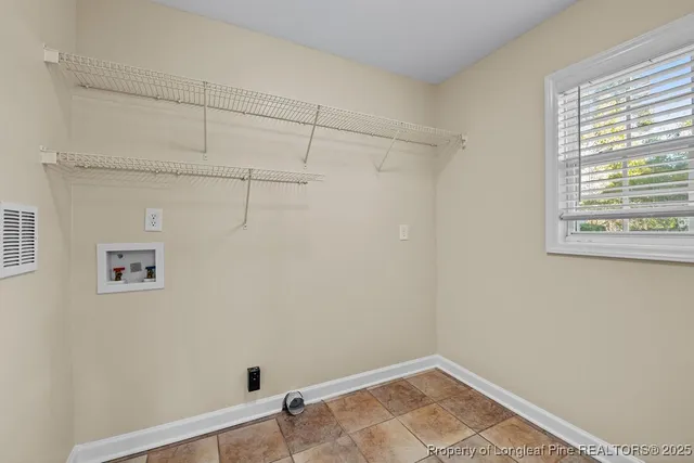 a view of a small space with racks on the wall