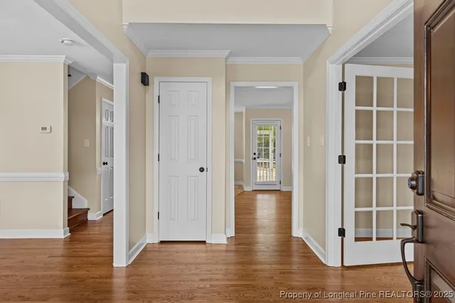 a view of entryway with wooden floor