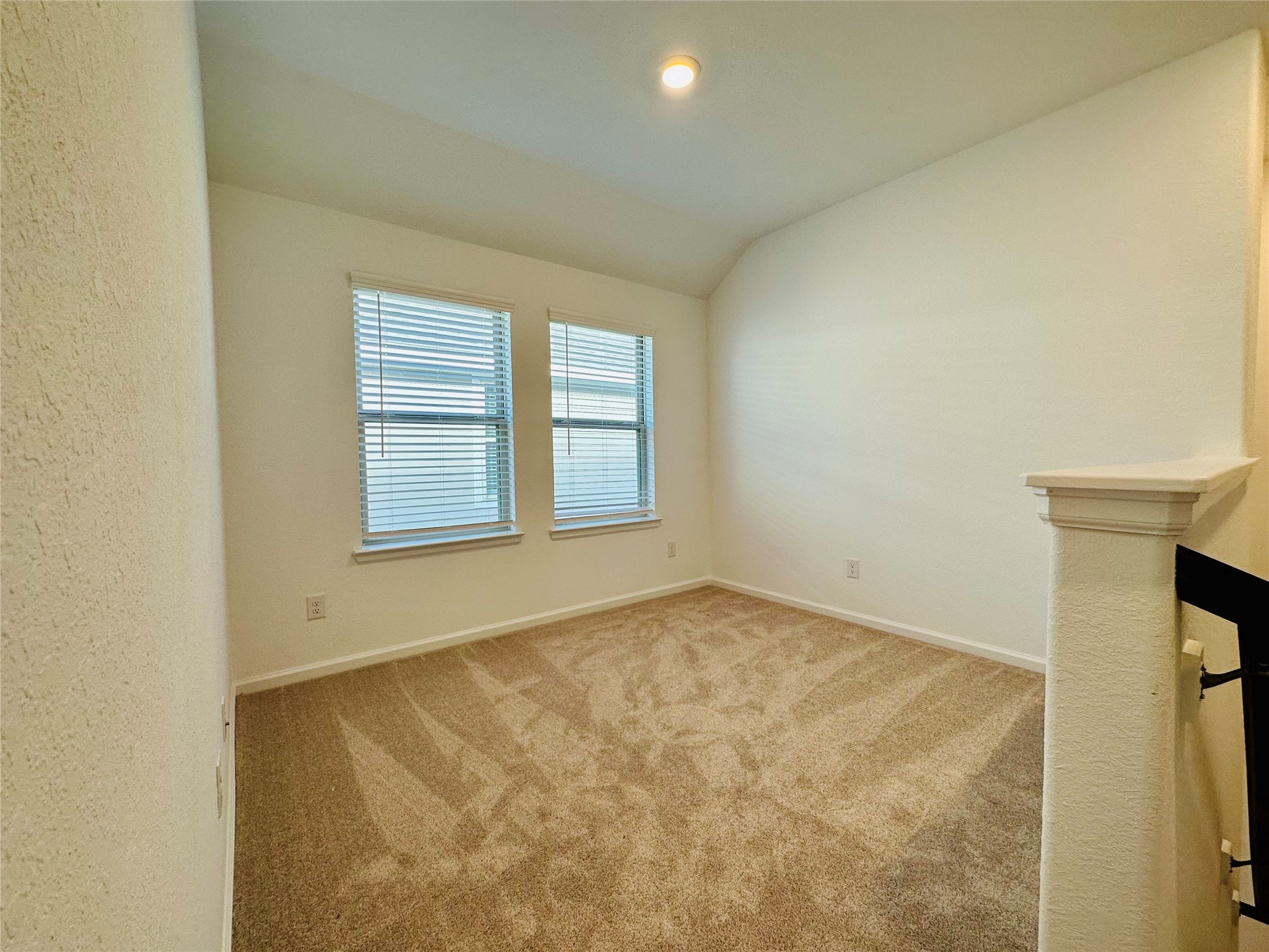 4143 Champlain Way Iowa Colony, TX 77583 - Photo 11 of 28 an empty room with windows