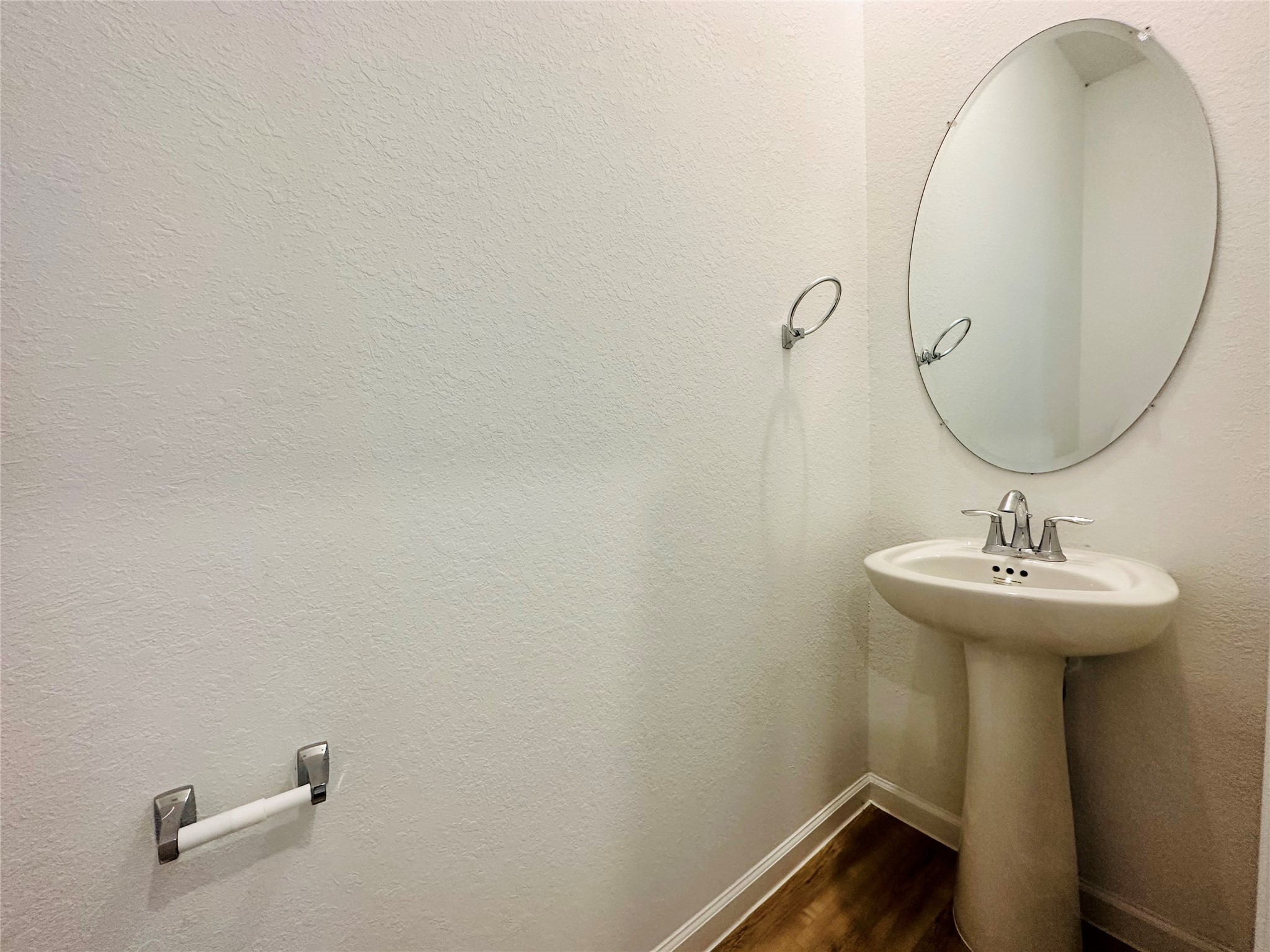 4143 Champlain Way Iowa Colony, TX 77583 - Photo 14 of 28 a bathroom with a sink and mirror
