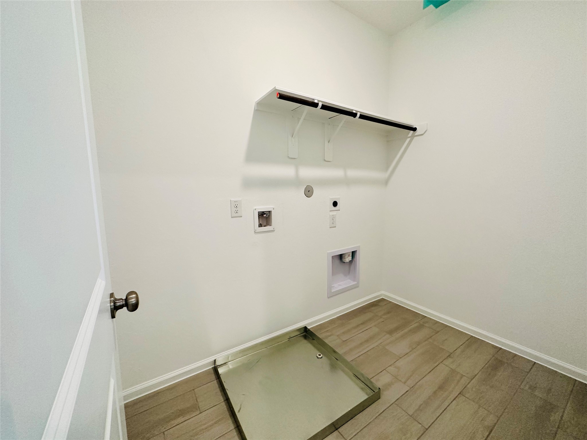 4143 Champlain Way Iowa Colony, TX 77583 - Photo 16 of 28 an empty room with a wooden floor and white walls