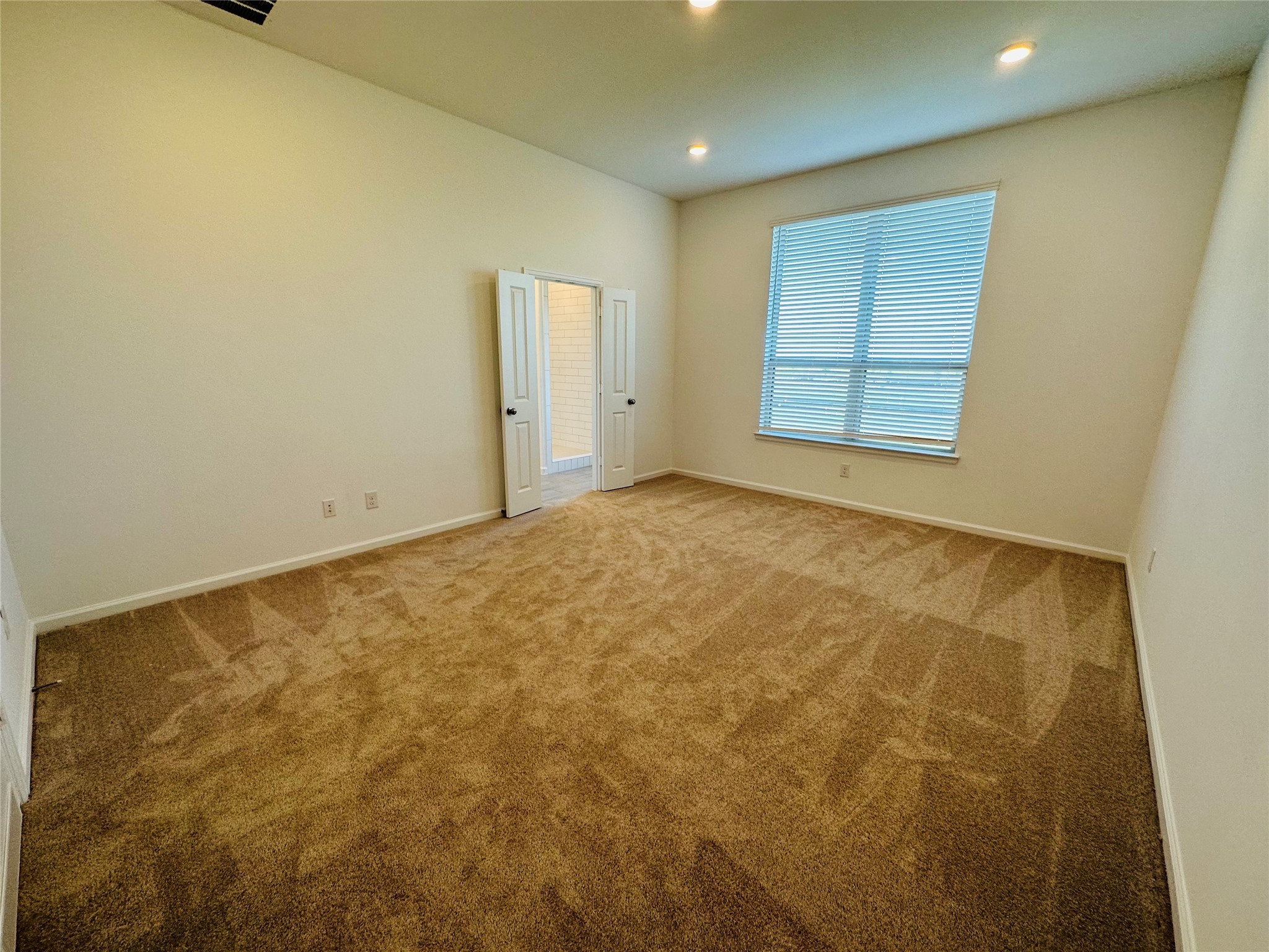 4143 Champlain Way Iowa Colony, TX 77583 - Photo 9 of 28 an empty room with windows