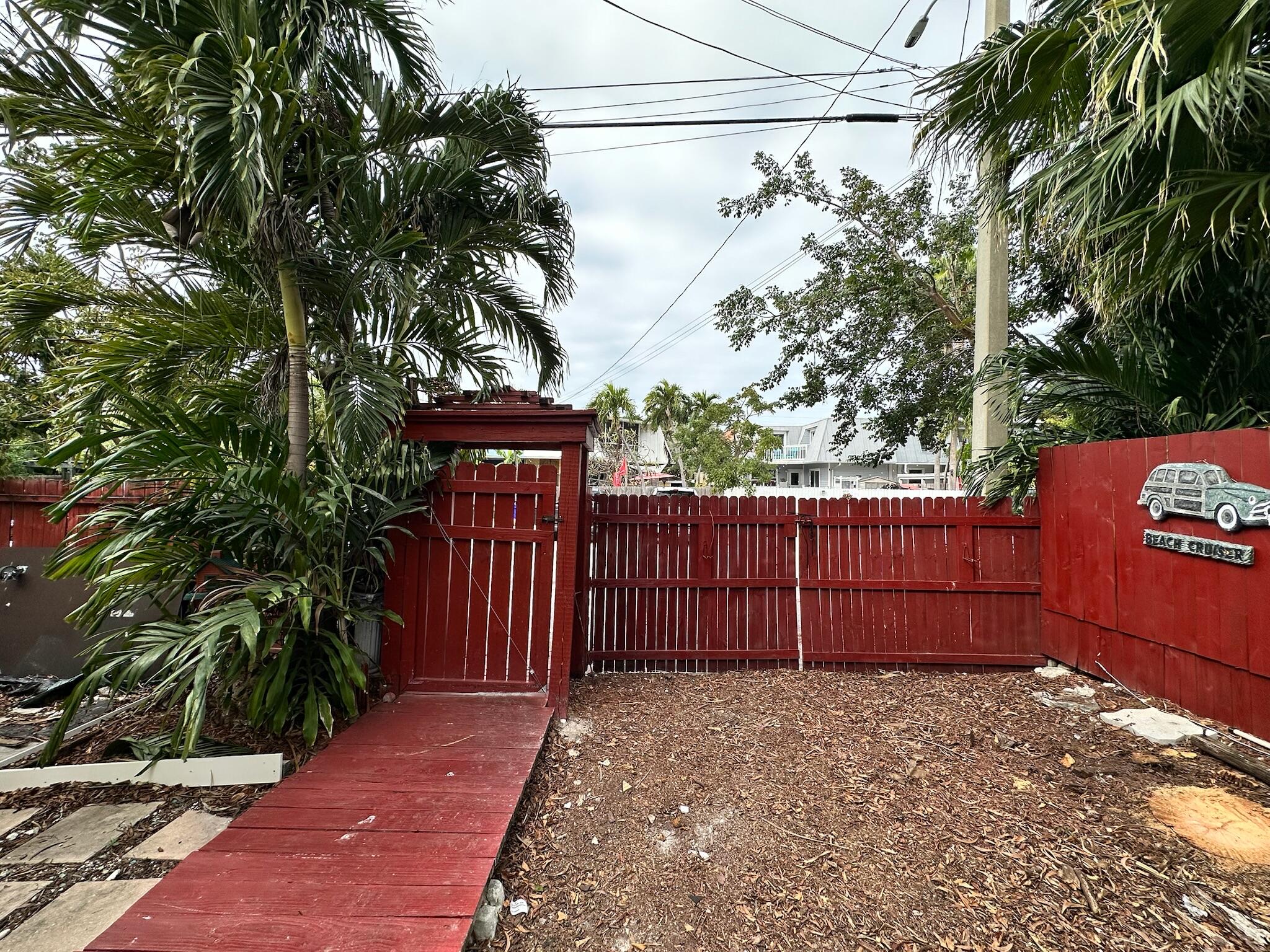 3210 Eagle Avenue Key West, FL 33040 - Photo 27 of 35 a backyard of a house with lots of green space
