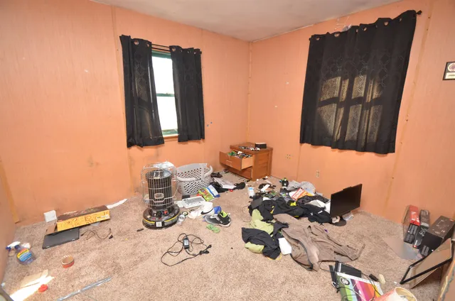 a bathroom with a sink mirror and vanity